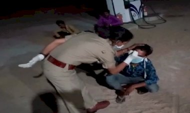 mp police written on worker's  forehead