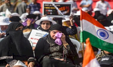A woman gets emotional during a protest against CAA and NRC