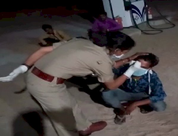 mp police written on worker's  forehead